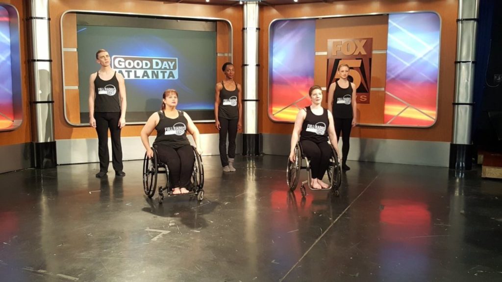 Full Radius Dance performers, two in wheel chairs, dance on Fox Fife Atlanta News
